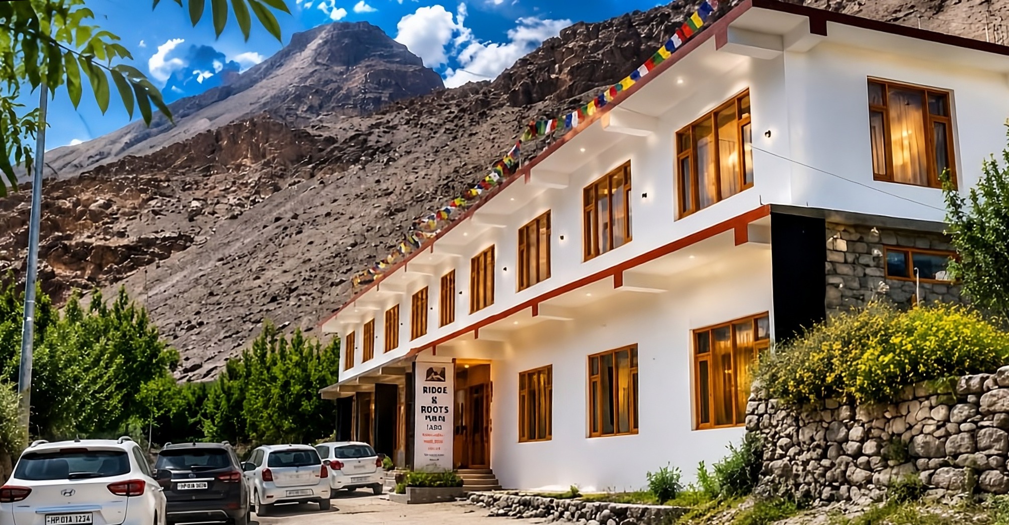 Ridge and Roots Hotel: Where Desert Cliffs Meet Lush Apple Orchards