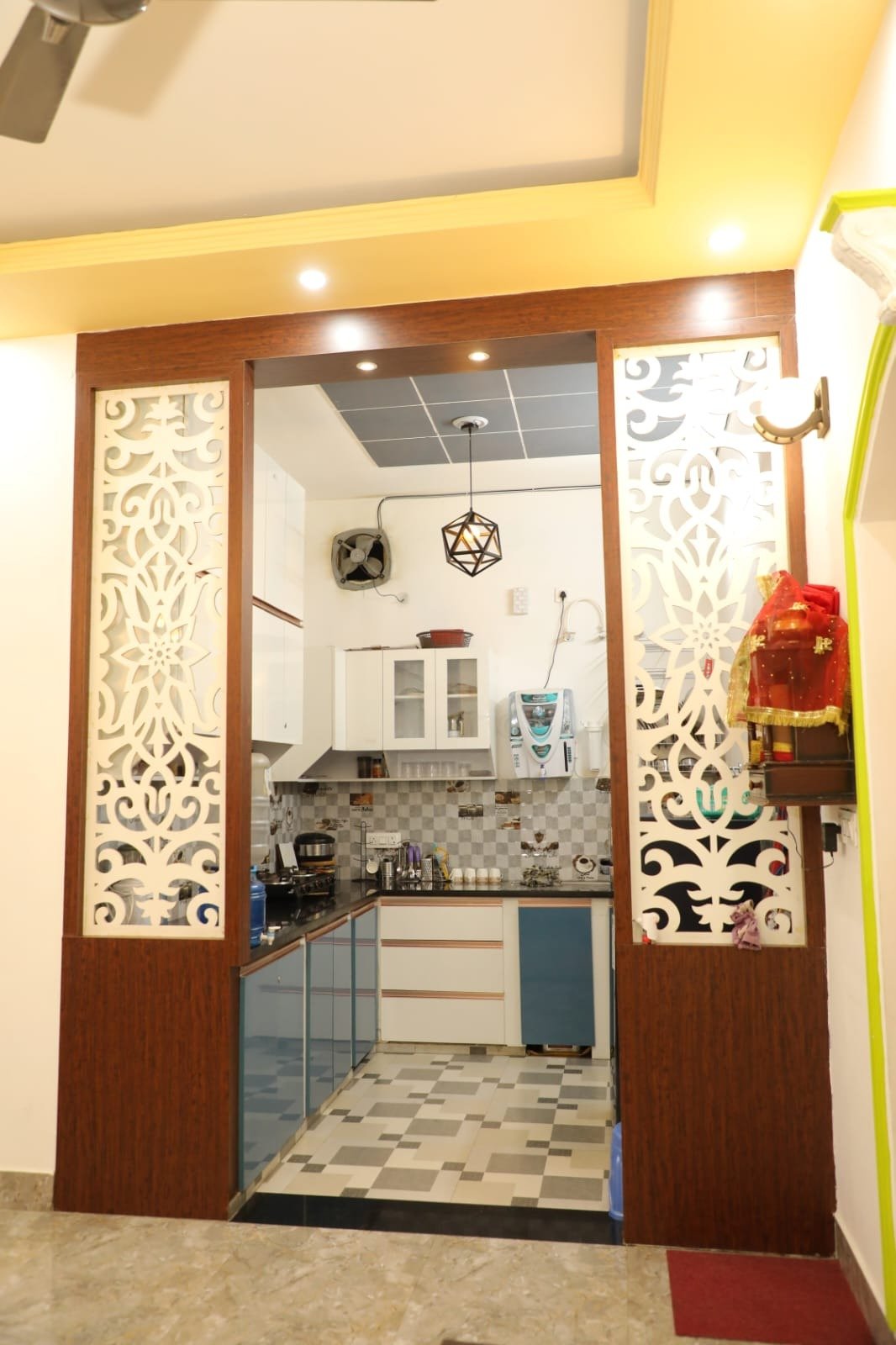 Fully equipped modern kitchen featuring essential appliances and amenities for comfortable, home-cooked meals.