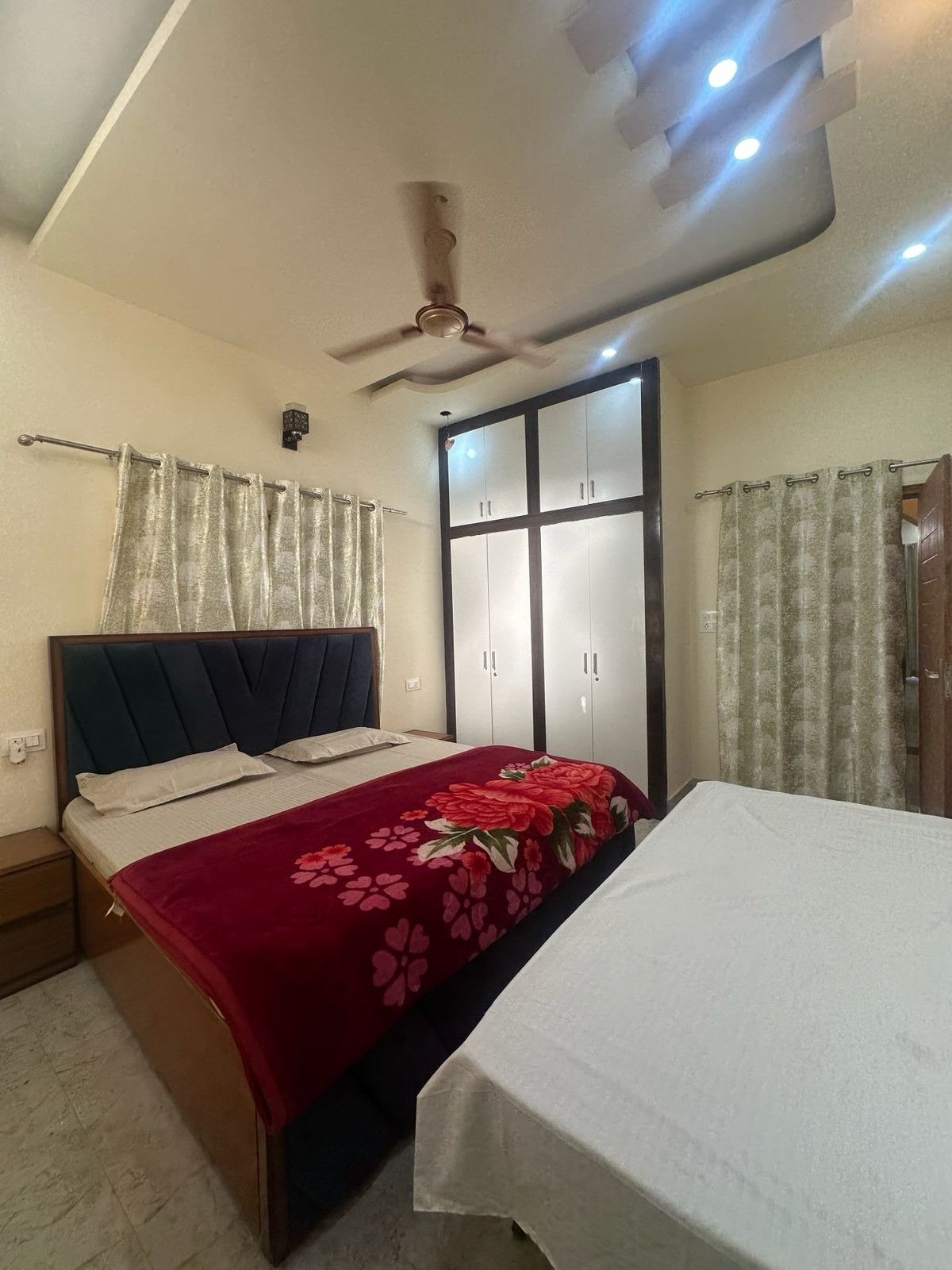 Spacious, comfortably furnished bedroom for a peaceful stay.