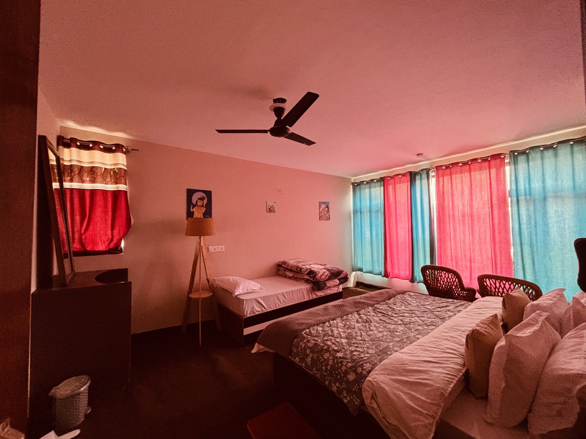 Cozy and warm room interior at White Lotus Homes in Tabo, featuring traditional wooden architecture and a scenic mountai