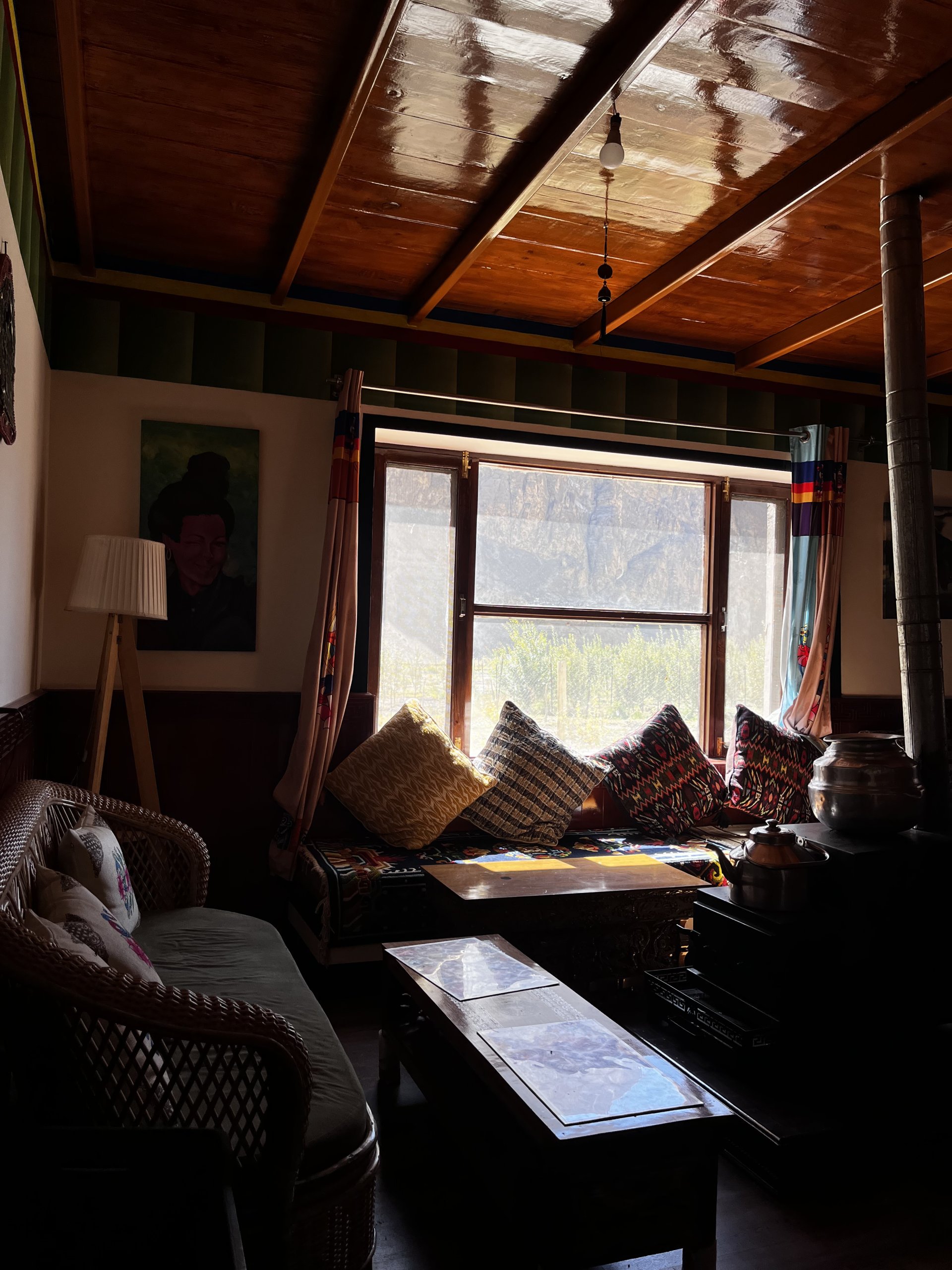 Cozy indoor tandoor and traditional heating setup at White Lotus Homes in Tabo, offering warmth during chilly Himalayan