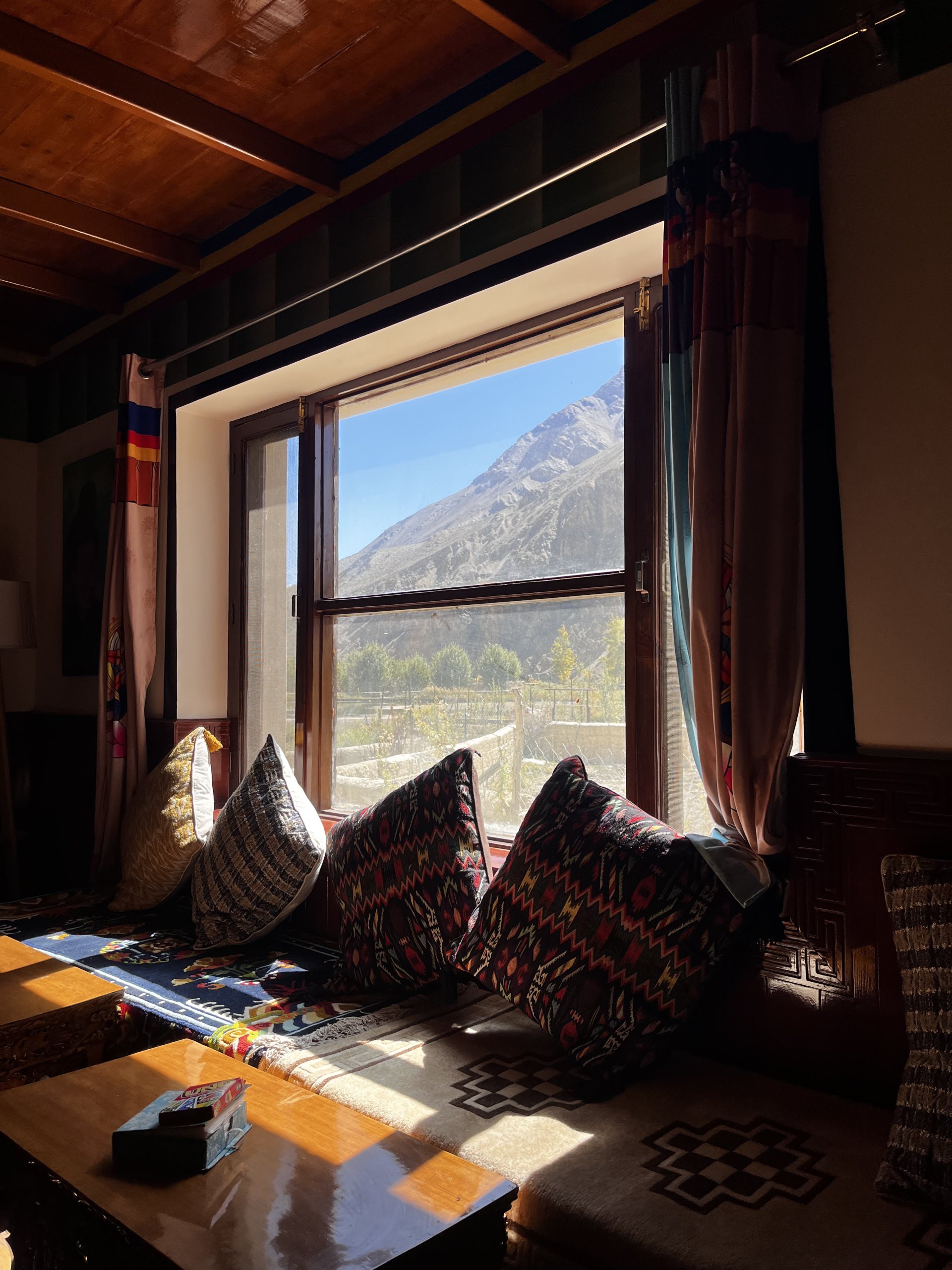 Cozy indoor tandoor and traditional heating setup at White Lotus Homes in Tabo, offering warmth during chilly Himalayan